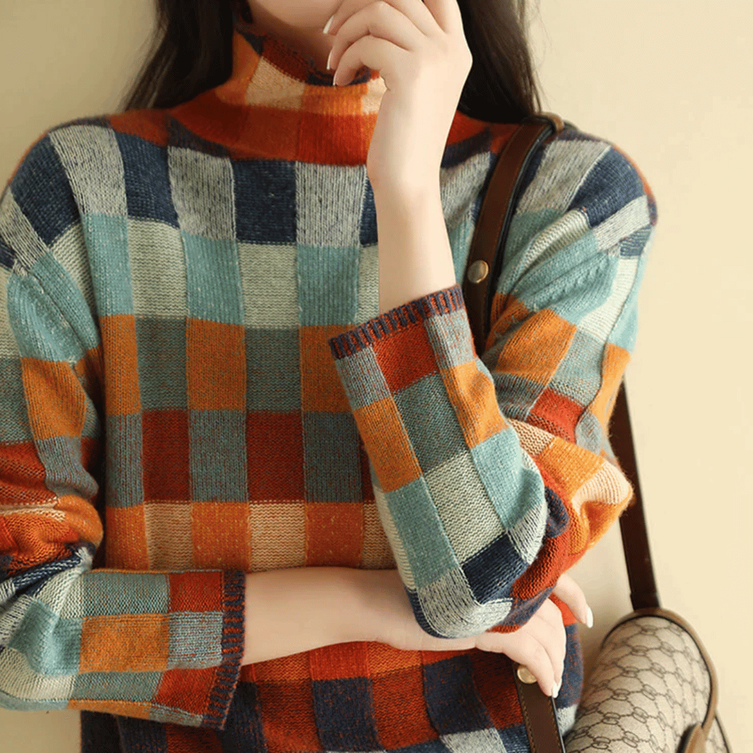 Elegante jersey de mujer LYNAIRA, cuello alto y diseño de cuadros, una prenda versátil para el invierno.