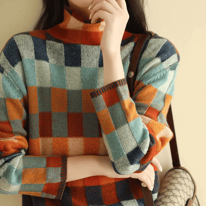 Elegante jersey de mujer LYNAIRA, cuello alto y diseño de cuadros, una prenda versátil para el invierno.