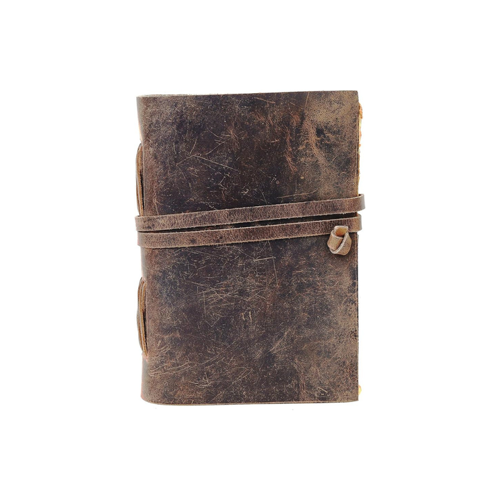 Cuaderno diario recargable de cuero vintage, ideal para escritura, dibujo y notas. Diseño artesanal.