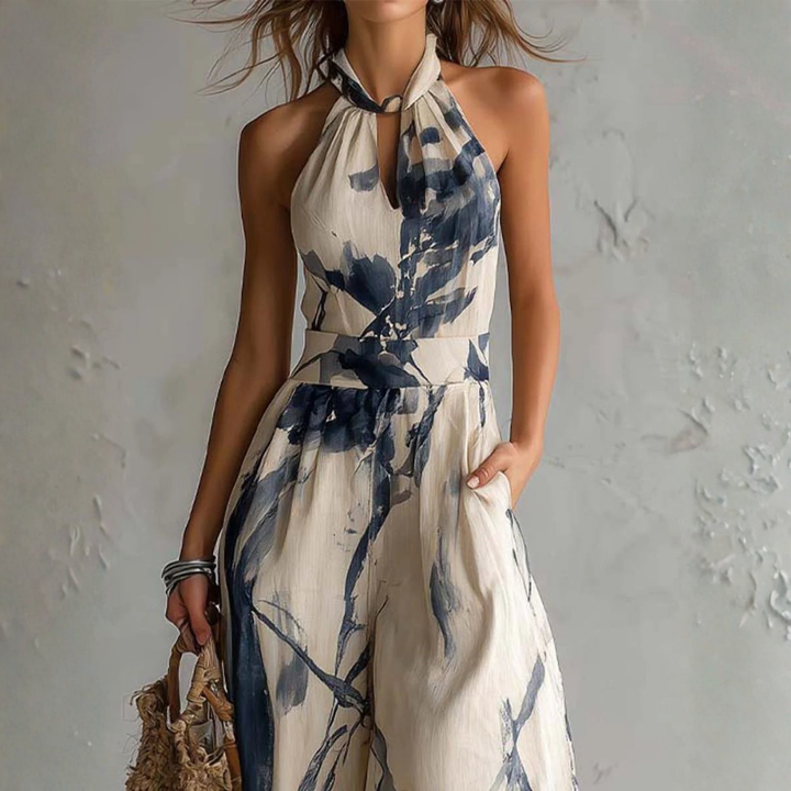 Mono de mujer halter con estampado artístico abstracto y piernas anchas. Estilo veraniego chic y fluido, muy elegante.