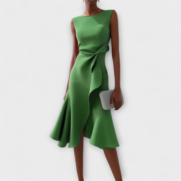 Vestido midi de moda femenina, sin mangas y con falda vuelo, perfecto para un estilo casual chic.