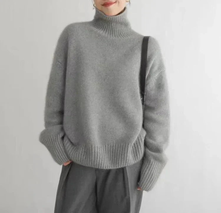 Cálido jersey de cachemir para mujer, cuello alto, estilo atemporal ideal para los días fríos.