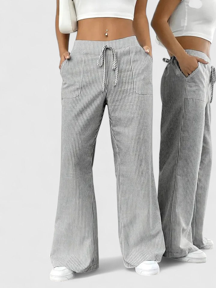 Pantalón rosa ancho, cintura ajustable y tejido ligero. Ropa femenina casual y fresca.
