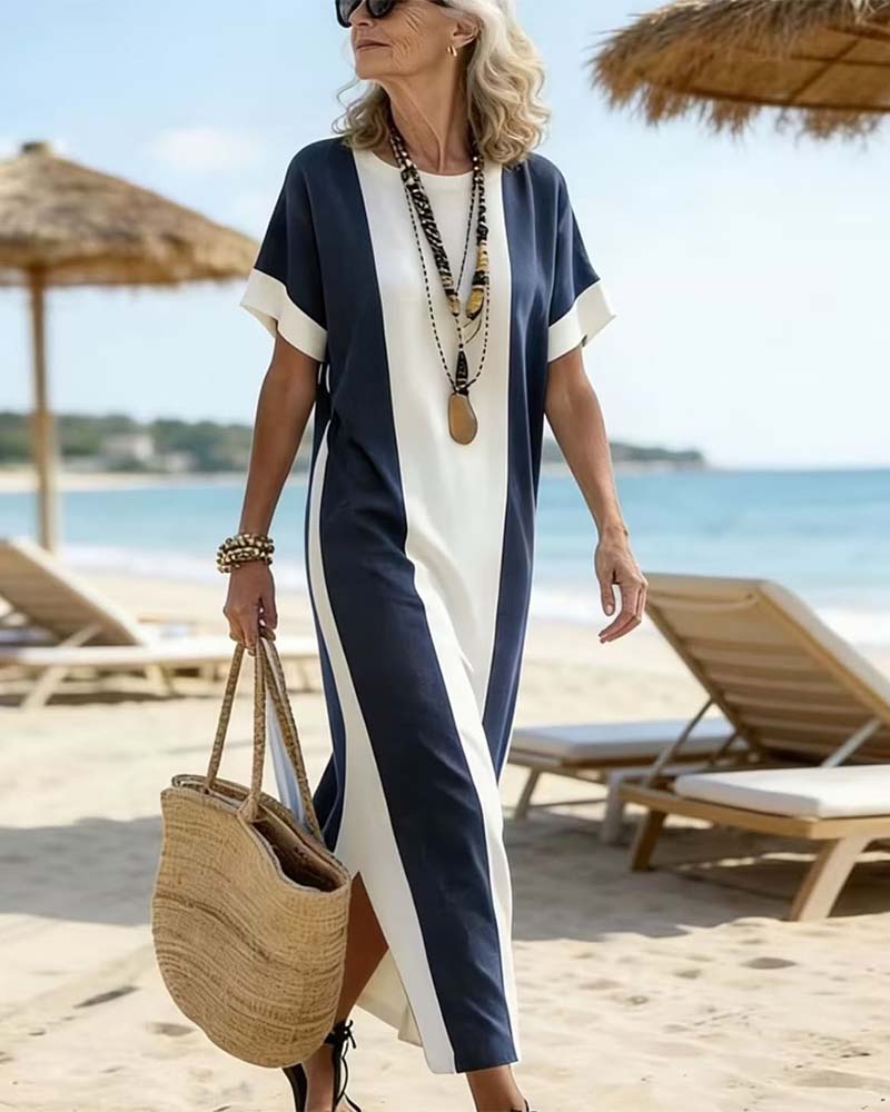 Vestido midi casual de rayas verticales para mujer, abertura lateral, estilo veraniego fluido.