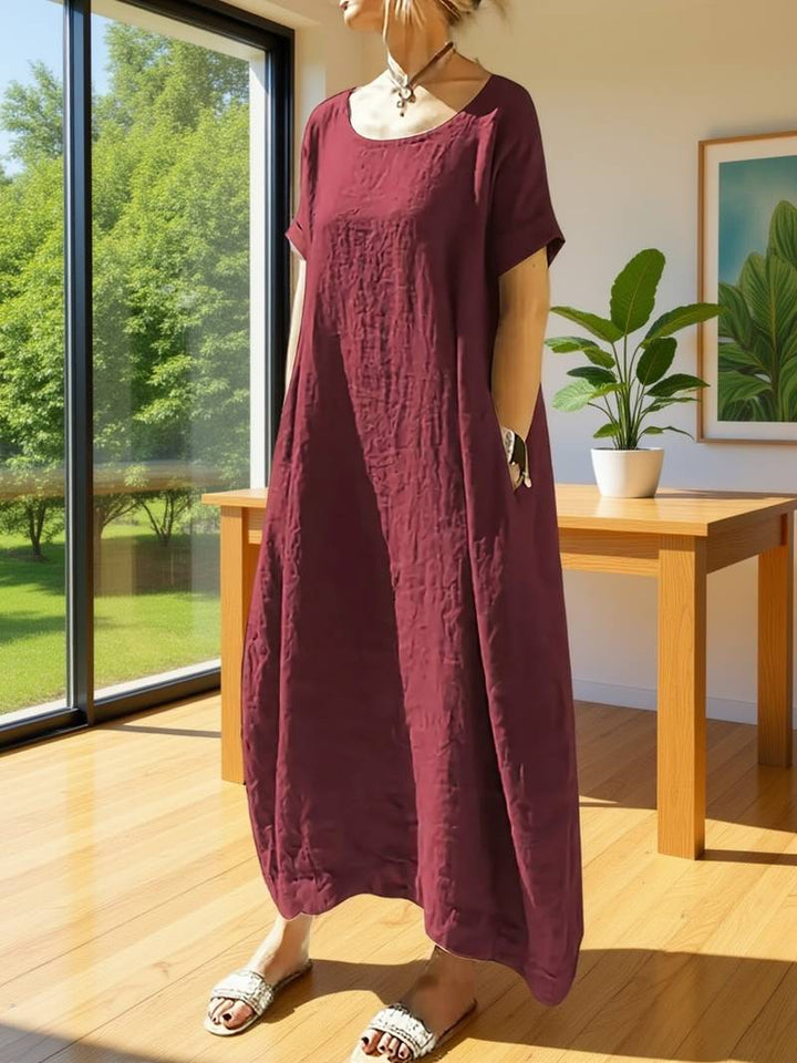 Vestido largo casual Lola para mujer con mangas amplias y corte relajado, ideal para el verano.