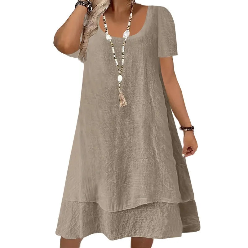 Vestido de mujer para primavera-verano, amplio y cómodo. Diseño casual con cuello redondo y manga corta.