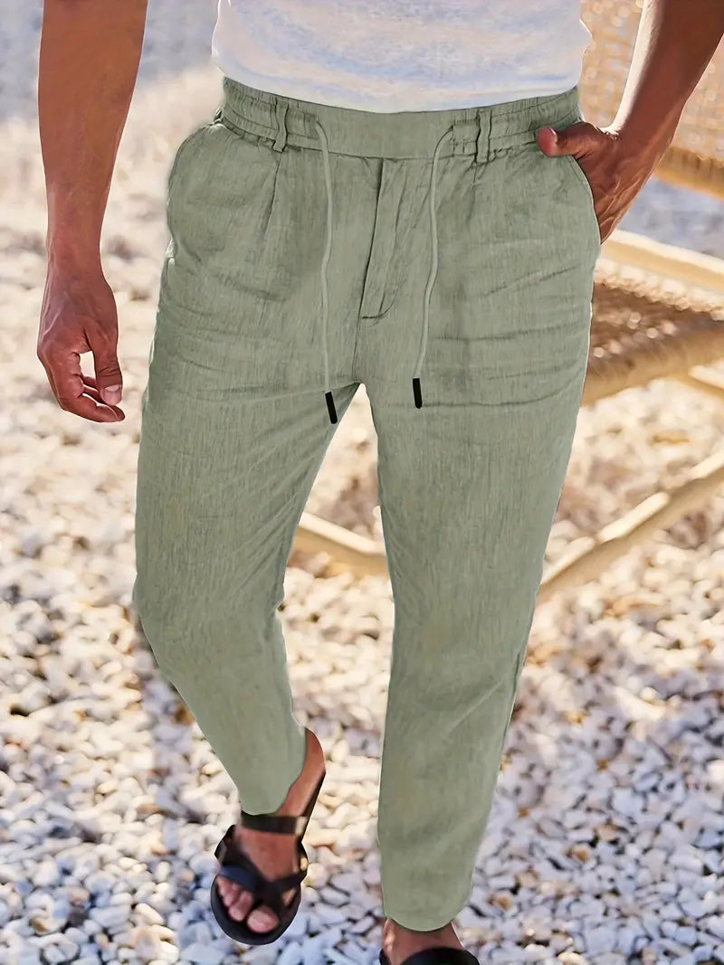 Comodidad y estilo: pantalones de lino largos para hombre con cordón, look veraniego relajado.