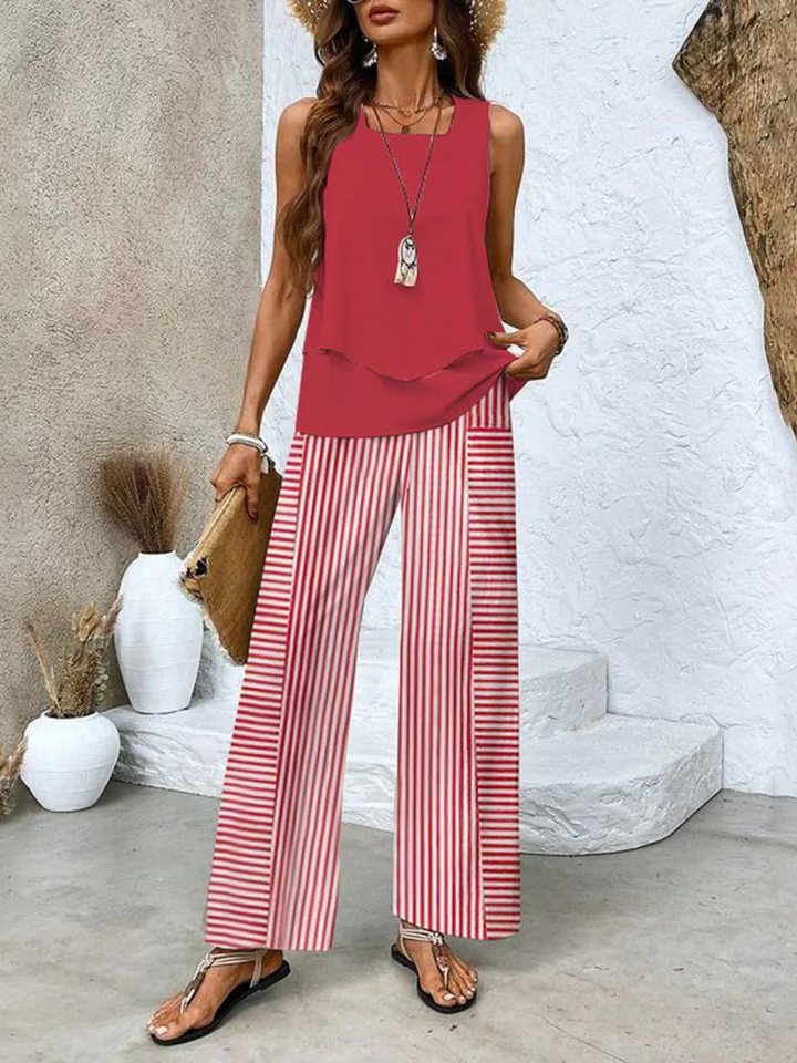 Look de verano chic: Conjunto transpirable de blusa y pantalón para mujer. Perfecto para días cálidos y moda fluida.