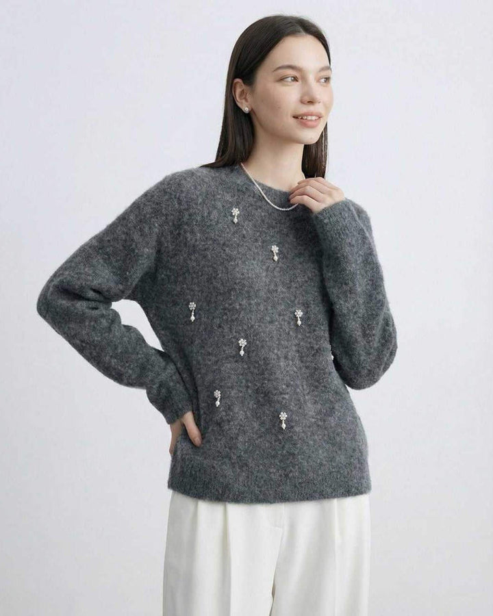 Jersey de punto gris para mujer, manga larga. Estilo casual elegante, ideal para otoño.