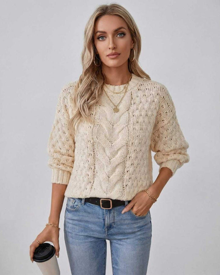 Suéter de punto trenzado color crema para mujer, diseño sofisticado y cómodo. Manga larga.
