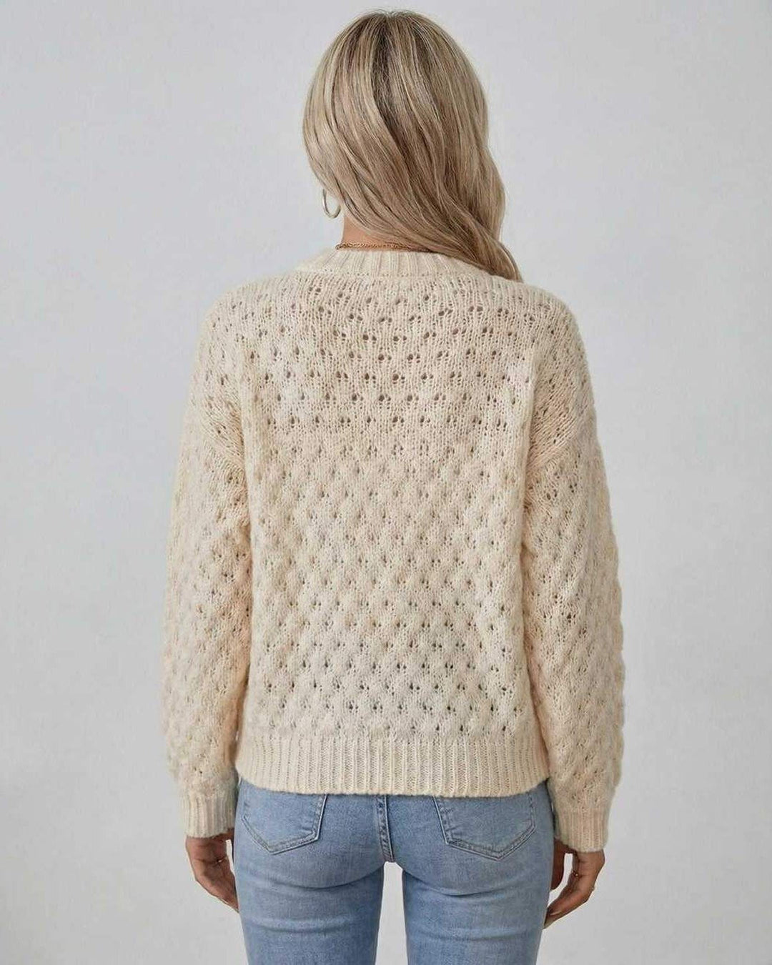 Suéter de mujer crema con diseño trenzado, estilo casual y elegante. Perfecto para otoño e invierno.