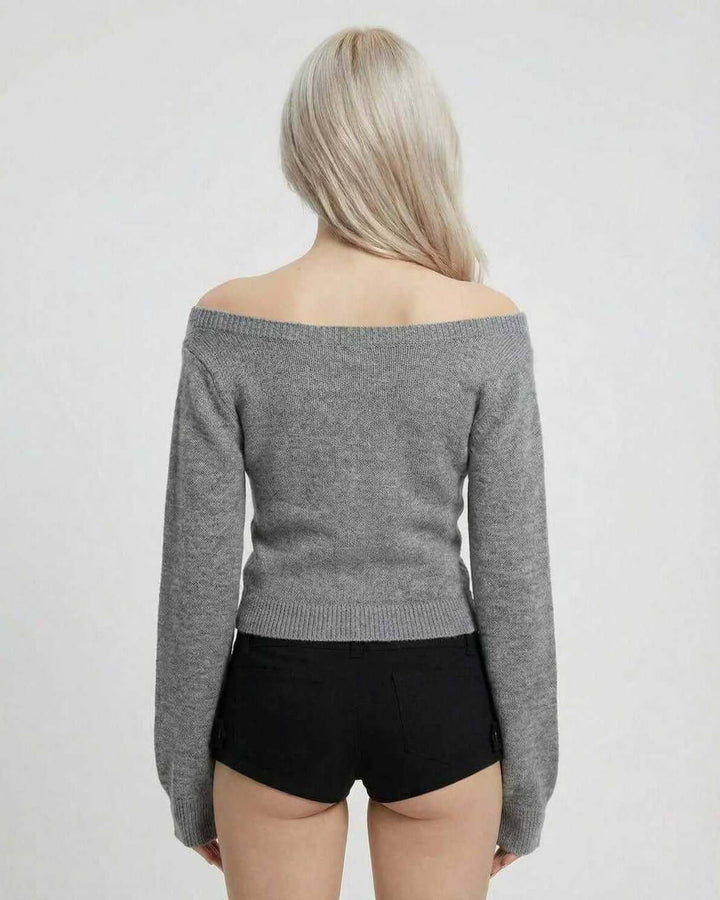 Suéter de mujer elegante con cuello V y manga larga. Prenda slim fit y versátil para otoño e invierno.