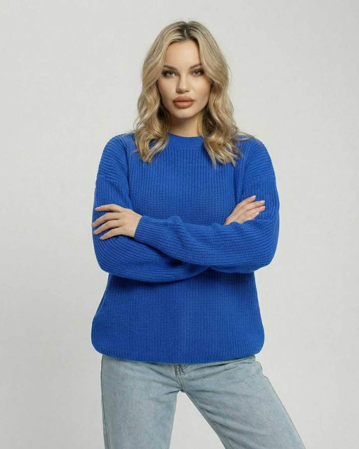 Suéter azul elegante y relajado para mujer, manga larga y cuello redondo. Comodidad y estilo garantizados.