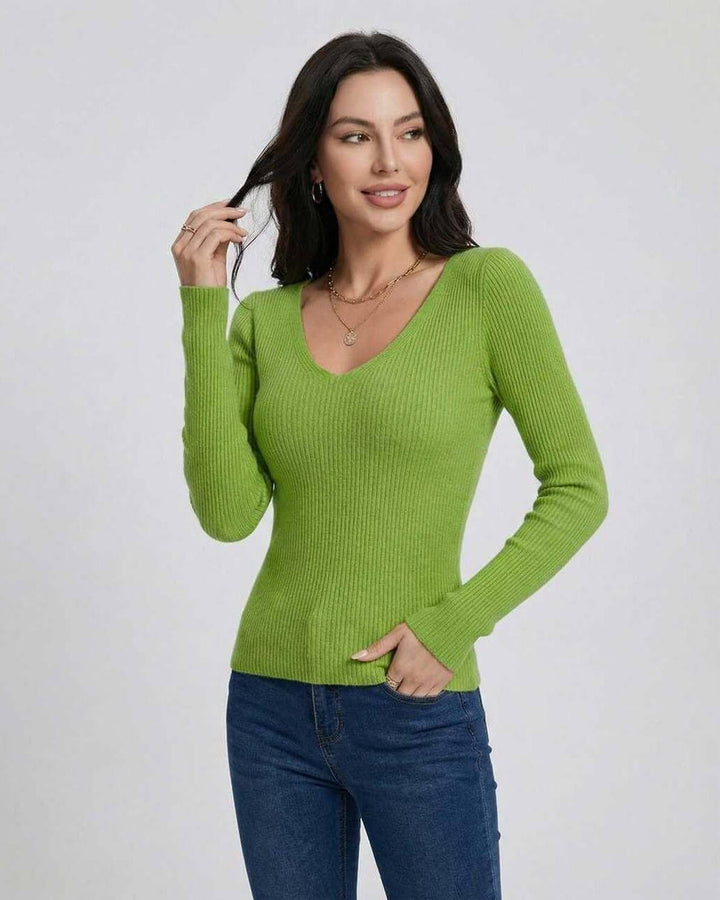 Suéter V-neck de mujer, manga larga. Tejido suave y ajuste cómodo, perfecto para otoño e invierno.