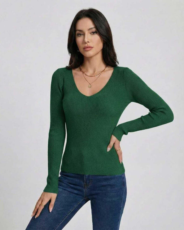 Suéter de mujer blanco con cuello V, ajuste ceñido y manga larga, ideal para otoño.