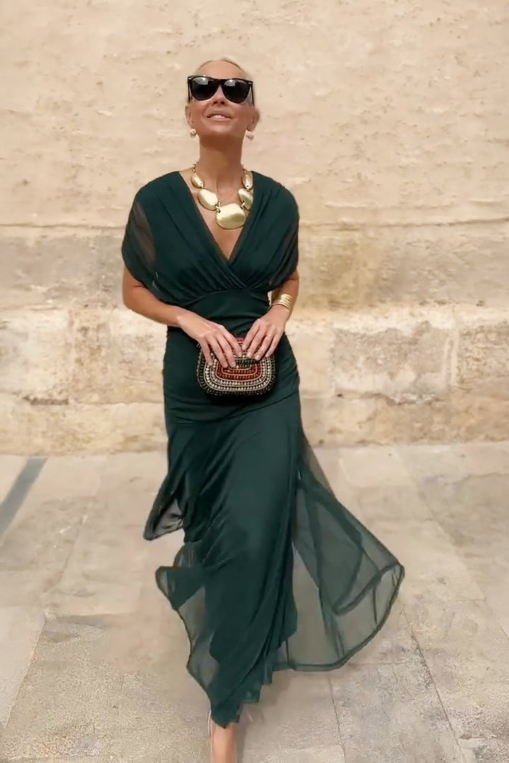 Vestido de noche maxi para mujer, escote en V profundo, estilo elegante y fluido.