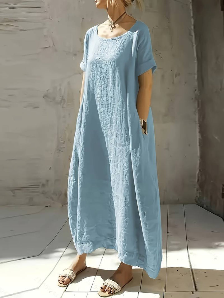 Vestido largo de mujer Lola, diseño amplio y tejido ligero, perfecto para un look casual y fresco de verano.