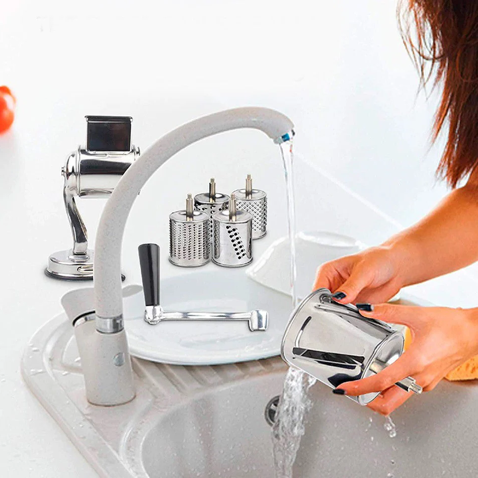 Utensilio manual multifuncional para cortar y rallar verduras y queso sin esfuerzo en la cocina de tu hogar.