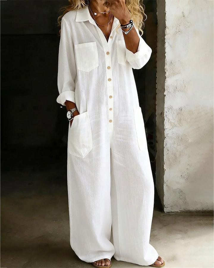 Mono camisero de algodón blanco para mujer, estilo fluido y veraniego, ideal para look casual chic.