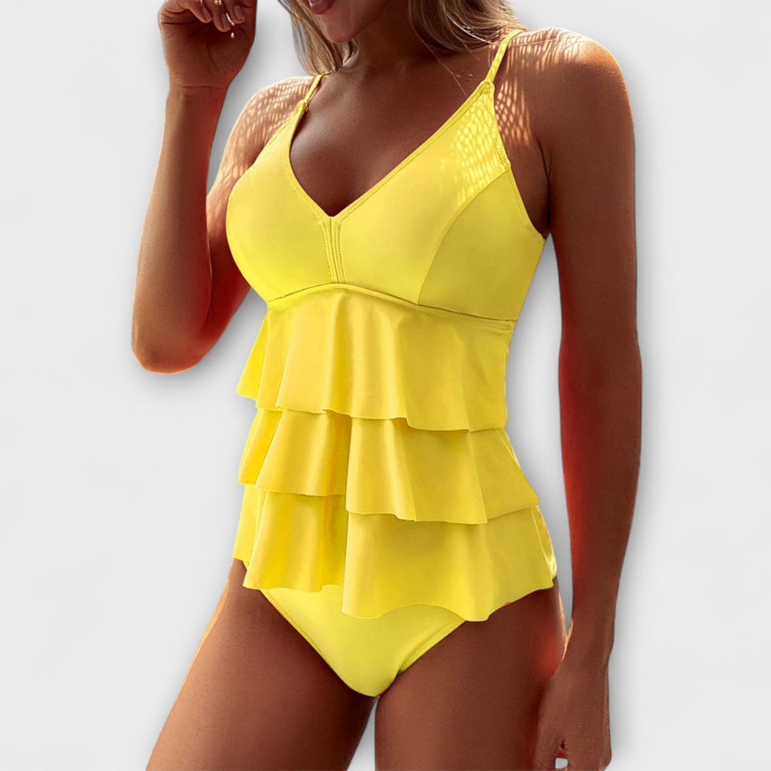 Traje de baño tankini para mujer, diseño con volantes y escote V. Moda de verano para la playa.