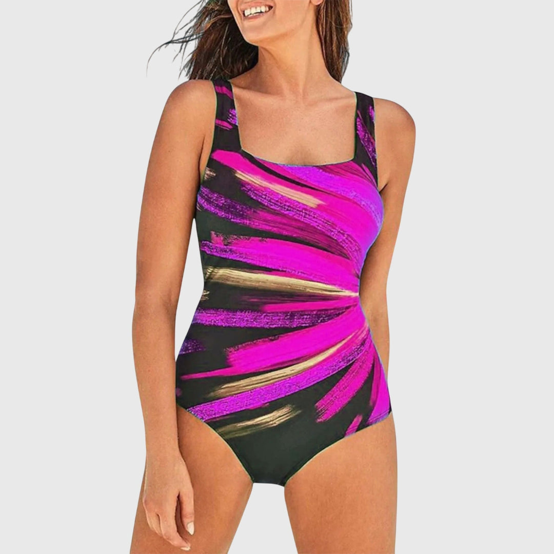 Bañador de mujer una pieza con escote cuadrado y estampado de pinceladas abstractas para playa.