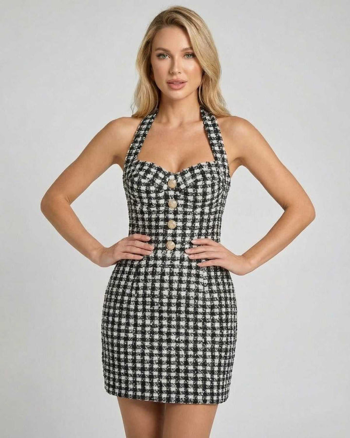 Vestido mini de corte A, sin mangas, con cuello halter y estampado a cuadros. Ropa femenina versátil y moderna.