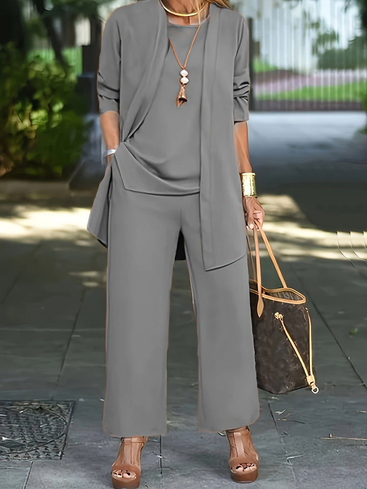 Conjunto femenino 3 piezas elegante de poliéster. Incluye pantalón, cárdigan y top. Comodidad.