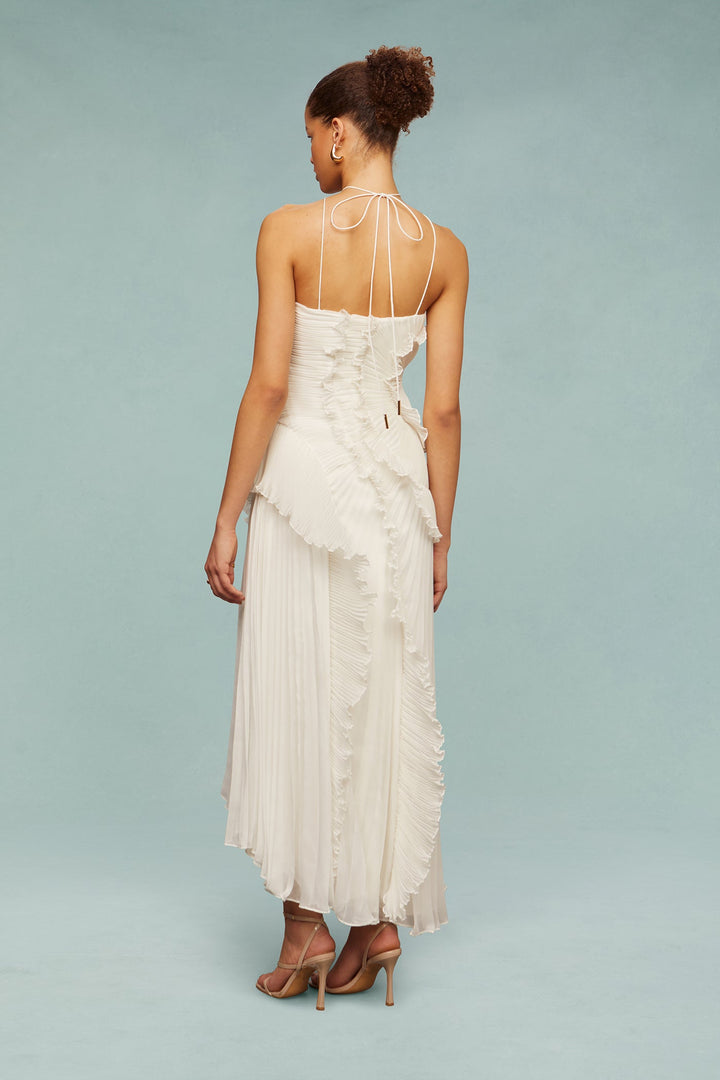 Vestido limón maxi, volantes y escote halter. Estilo fresco y fluido para tus eventos de verano.