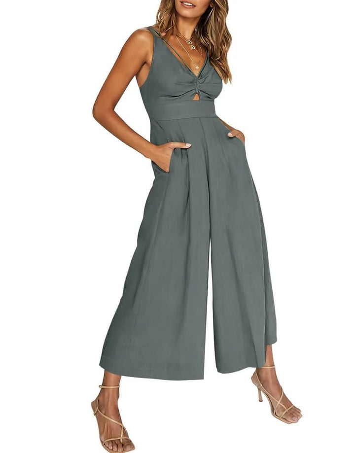 Mono de mujer para invitadas, escote V. Estilo chic con pierna ancha y diseño sin mangas moderno.