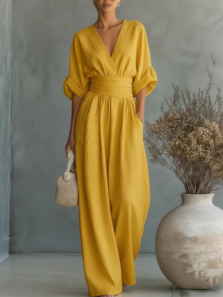 Ropa de fiesta femenina: mono moderno con cintura alta y escote profundo, estilo casual elegante.