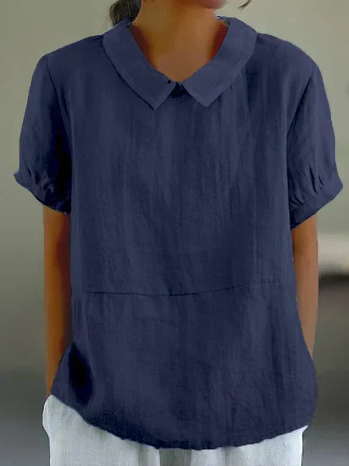 Blusa elegante de cuello alto para mujer, con caída fluida. Perfecta para la oficina o eventos casuales de verano.