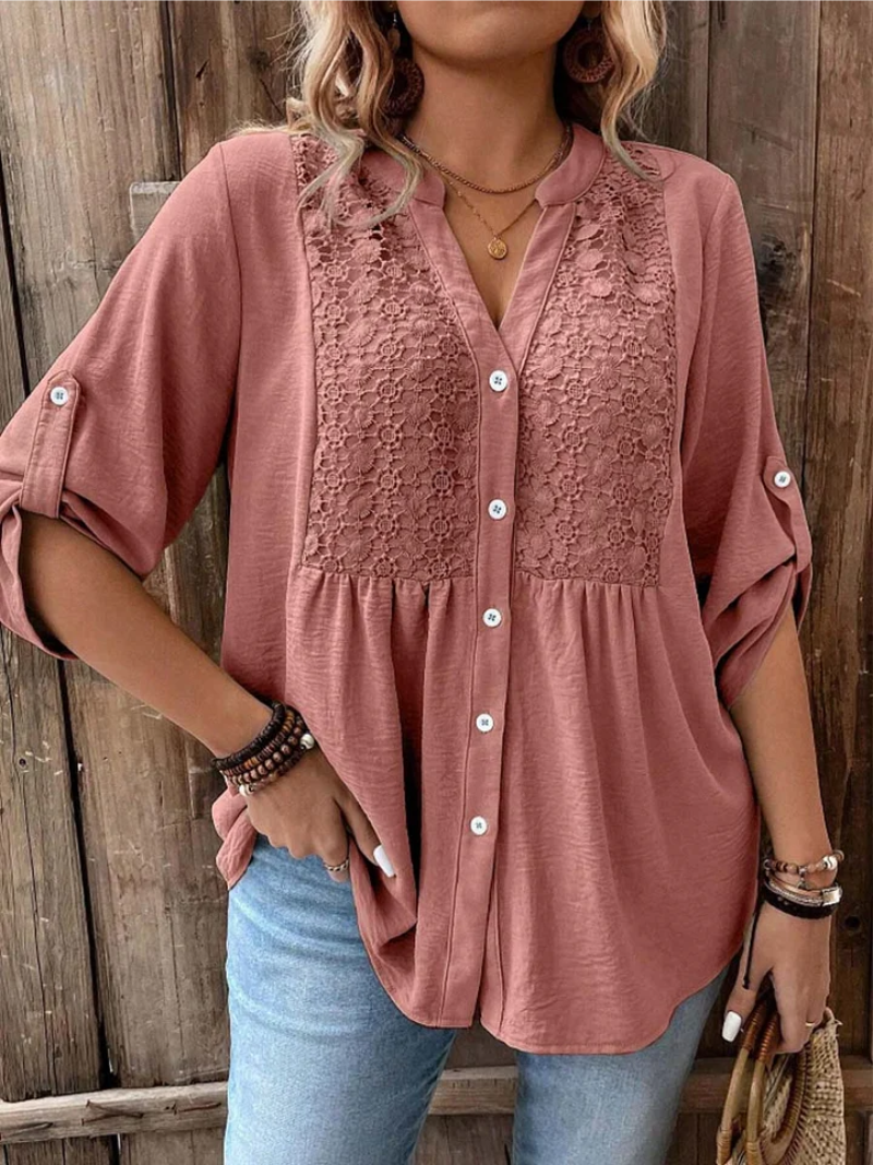 Blusa holgada de manga larga para mujer con escote V y botones, perfecta para un estilo cómodo y versátil.