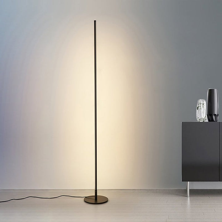 Moderna lámpara de pie LED con diseño minimalista, ideal para luz ambiente en cualquier espacio del hogar.