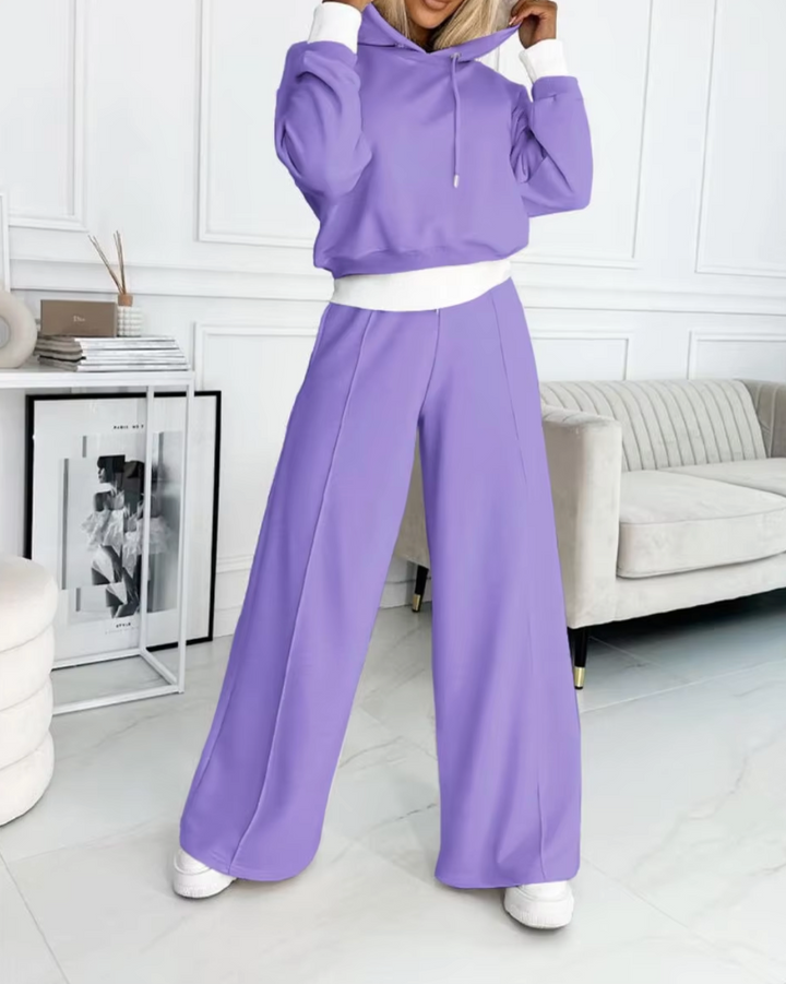 Conjunto de dos piezas para mujer: sudadera y pantalón ancho, ideal para un estilo relajado y casual.