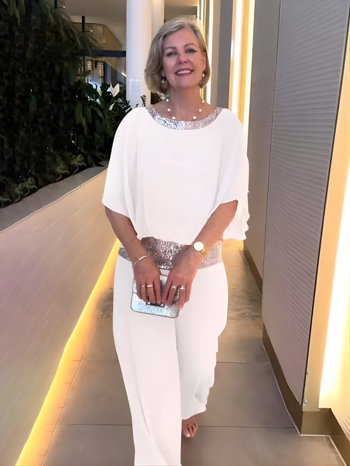 Detalle de la blusa brillante del conjunto Ramona de dos piezas para mujer, comodidad y elegancia.