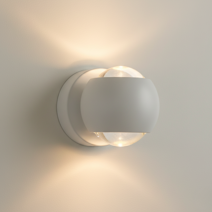 Lámpara de pared LED Diabolo. Diseño escultural, doble haz de luz para una iluminación interior contemporánea.