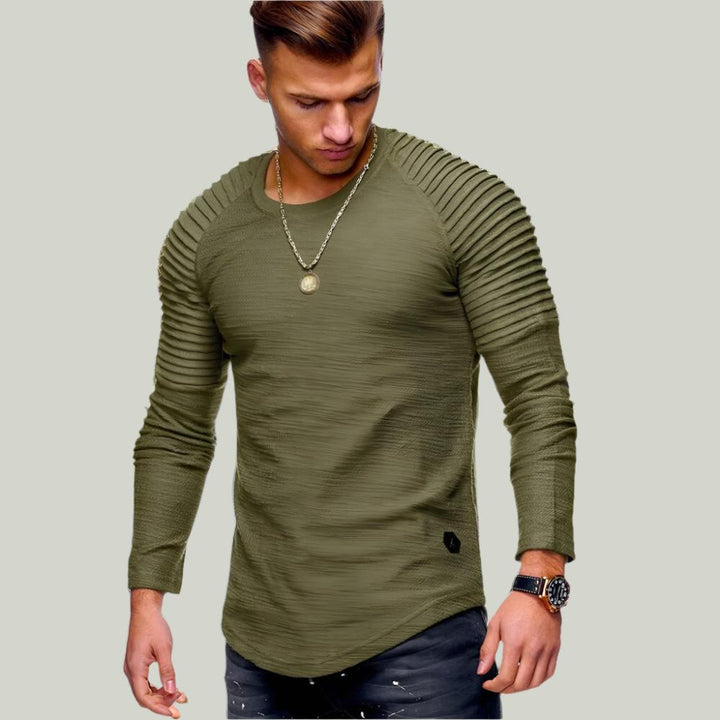 Jersey versátil de canalé para hombre. Suave, manga larga y cuello redondo. Perfecto para un look de otoño.