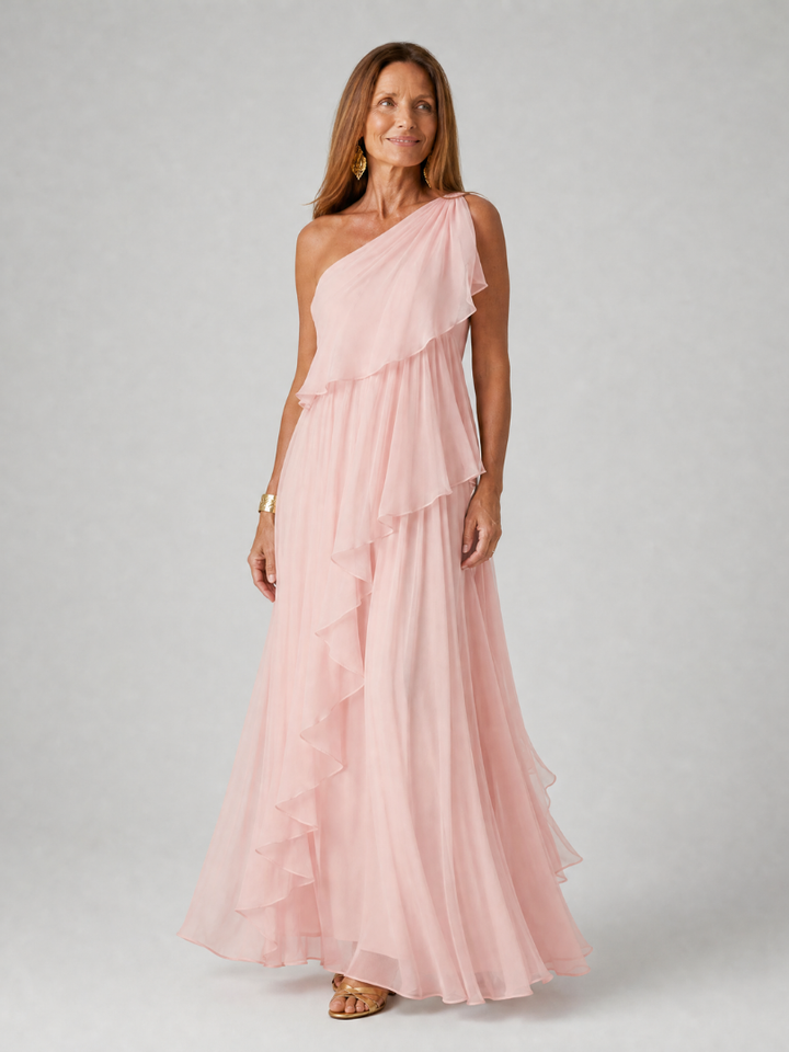 Vestido de noche asimétrico con volantes elegantes, diseño maxi para ocasiones especiales, tono azul real.