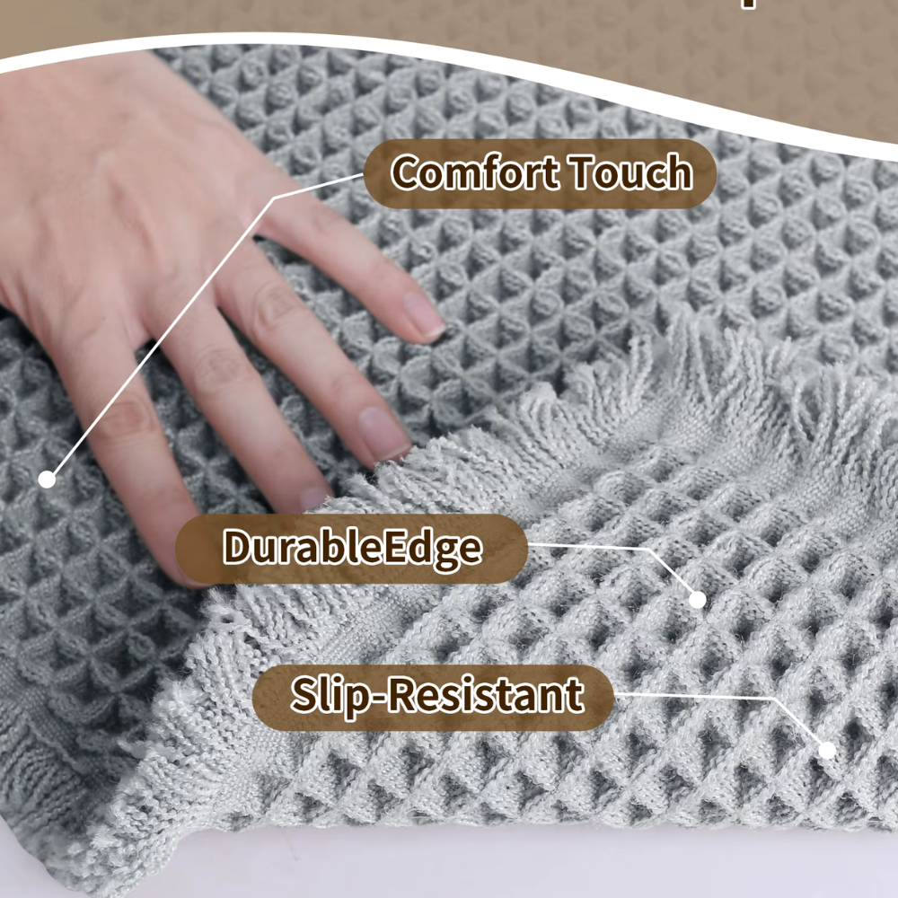 Alfombrilla de baño waffle de rápida absorción con borlas. Confortable y segura para el baño.