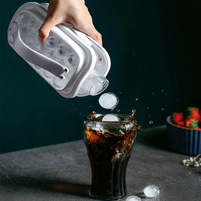 Accesorio de cocina innovador: vaso enfriador con molde para bolas de hielo. Ideal para bebidas frías de verano.