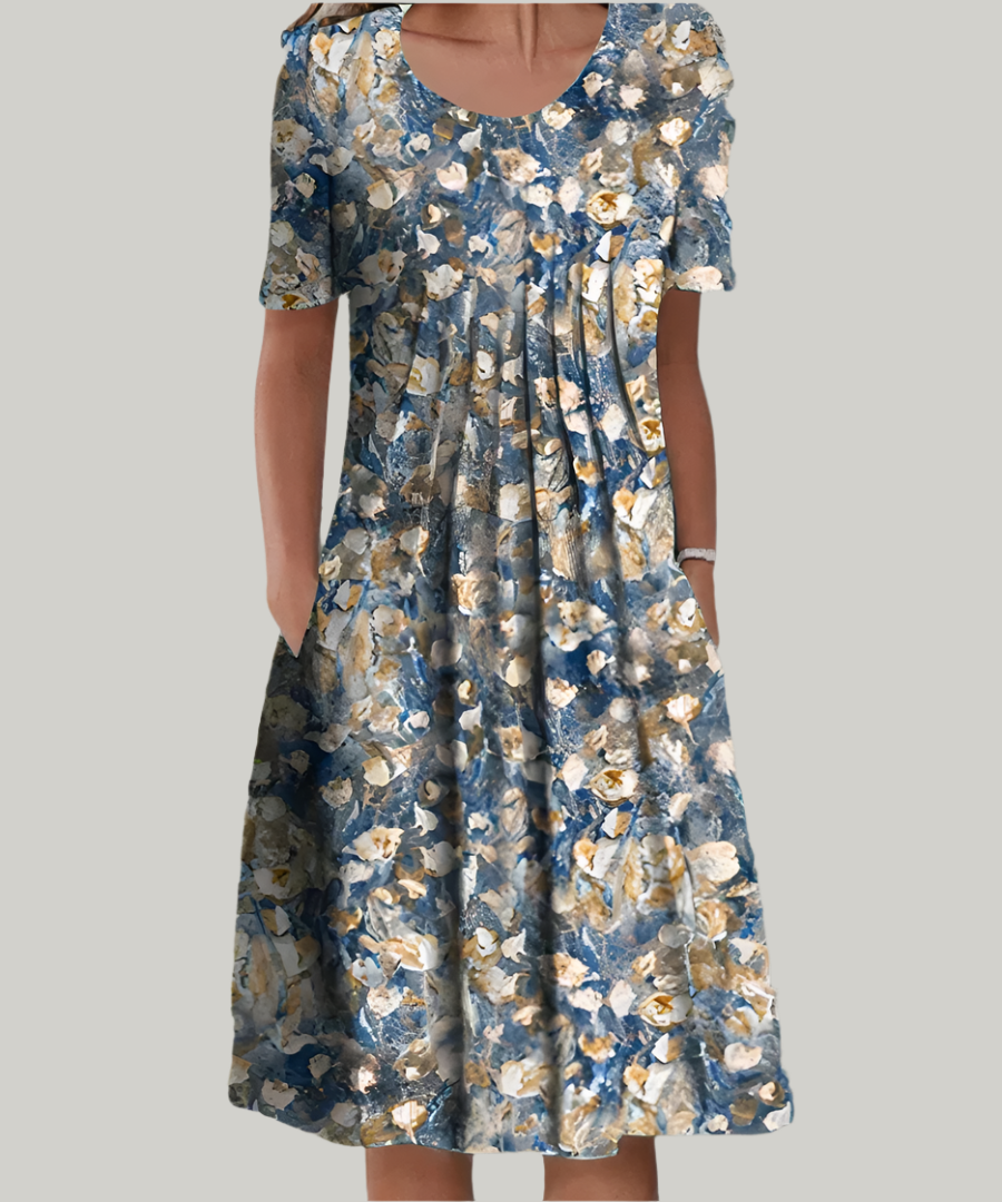 Vestido de mujer elegante, largo y fluido, con delicado estampado floral y escote V. Estilo primaveral.