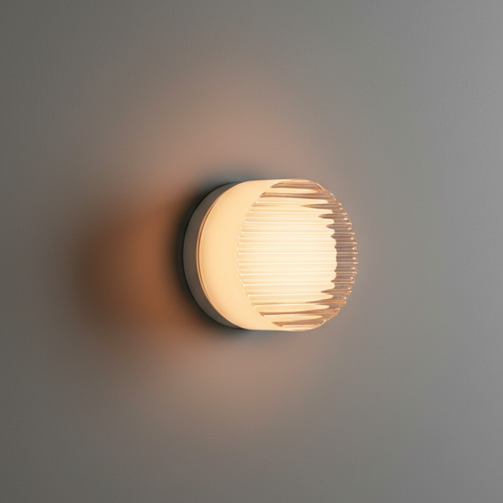Aplique de pared LED decorativo, diseño elegante y minimalista. Aporta luz ambiental cálida a tu hogar.