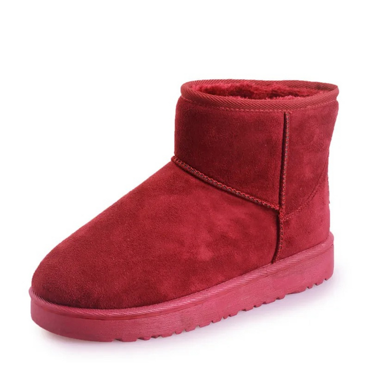 Botas de invierno para niñas con suela antideslizante, garantizan seguridad y calidez en superficies heladas.