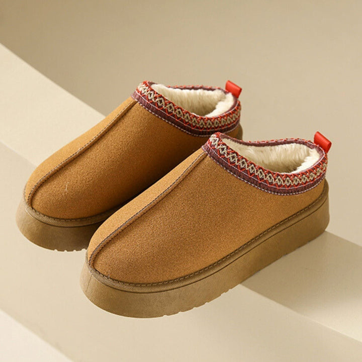 Pantuflas de mujer estilo vintage para comodidad en el hogar. Diseño retro ideal para descanso y relax.