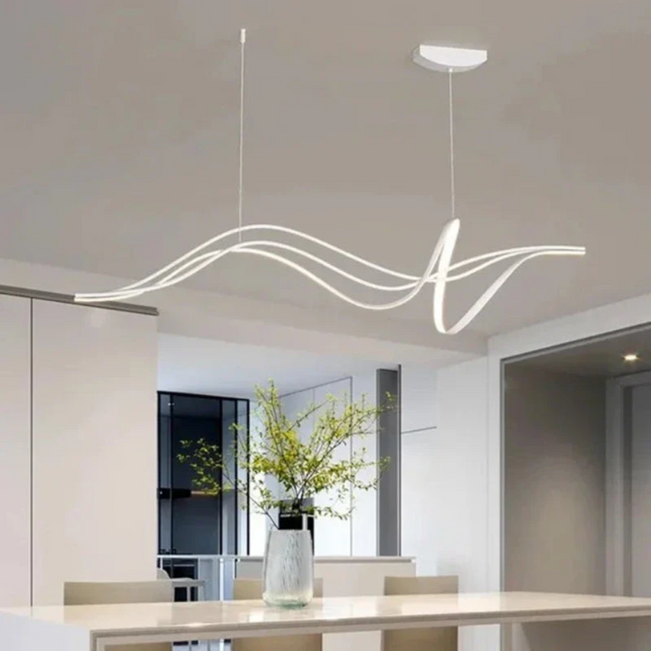 Lámpara colgante LED de estilo moderno con luz regulable, ideal para crear ambientes en salones o comedores.