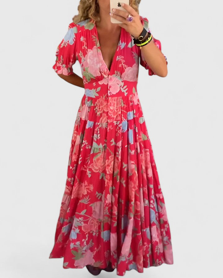 Vestido casual floral de mujer con cuello en V, tejido fluido y ligero. Estampado primaveral muy cómodo.