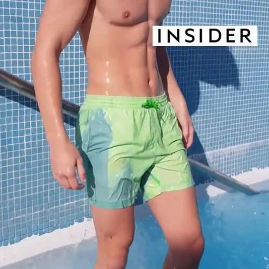 Primer plano de shorts de baño con efecto de cambio de color al mojarse. Ideal para verano, piscina, playa.