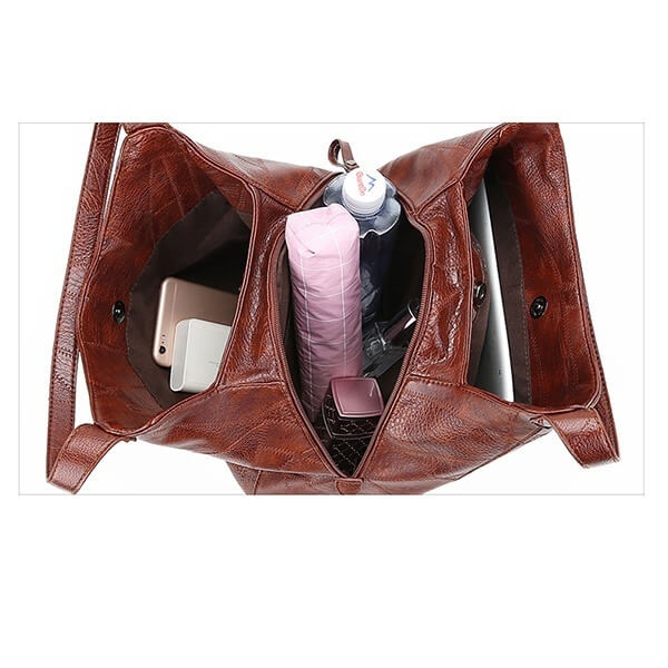 Bolso grande de mujer, piel sintética, con gran capacidad. Perfecto como organizador para el viaje.