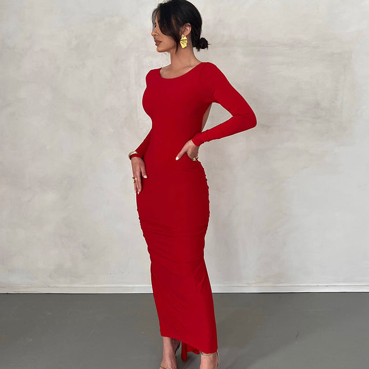 Vestido sofisticado para mujer, ideal invitada de boda en primavera. Manga larga y escote en espalda.