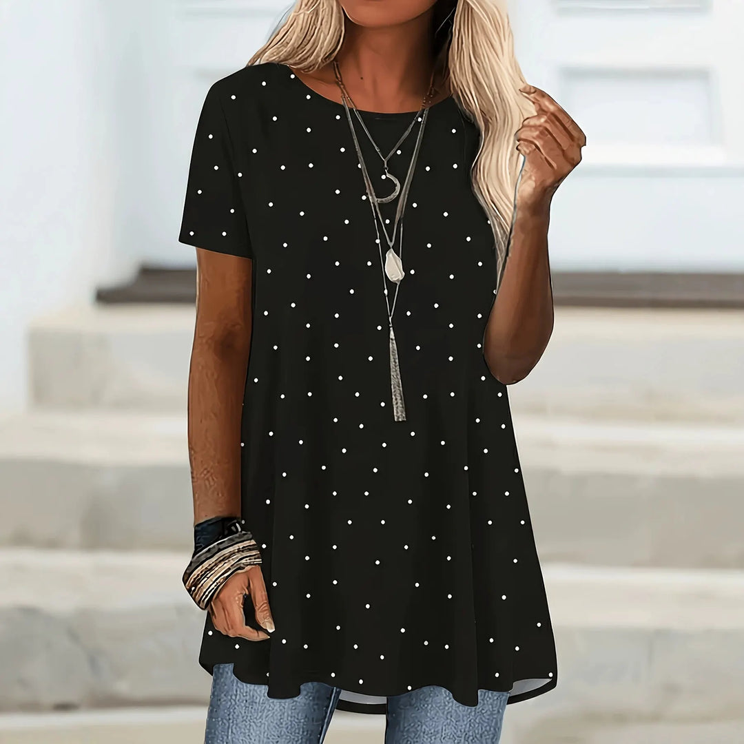 Blusa de moda femenina con lunares y corte A. Estilo chic para mujer, cómoda y versátil. Perfecta para primavera.